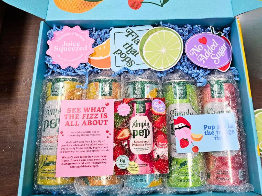Custom branded kitting and packaging by 3tree Marketing for Simply Pop influencer and promotional kits